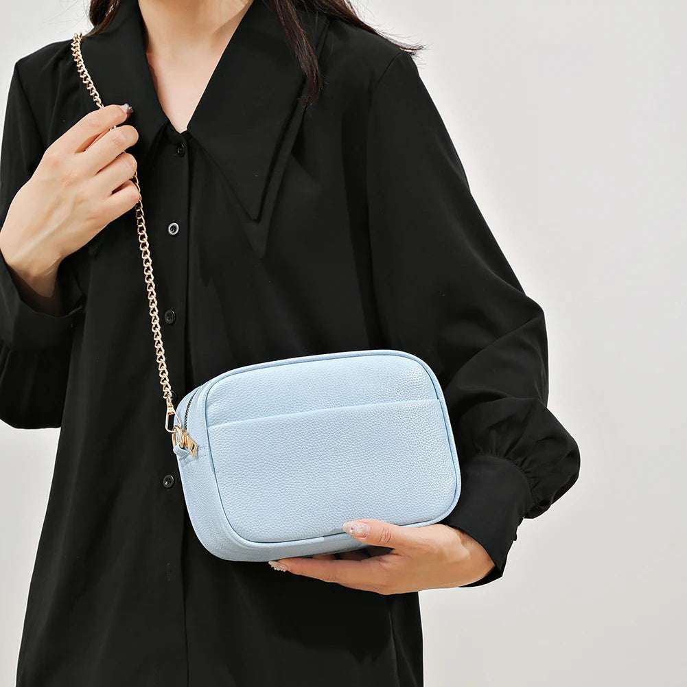 A modern women's handbag made of luxurious leather
