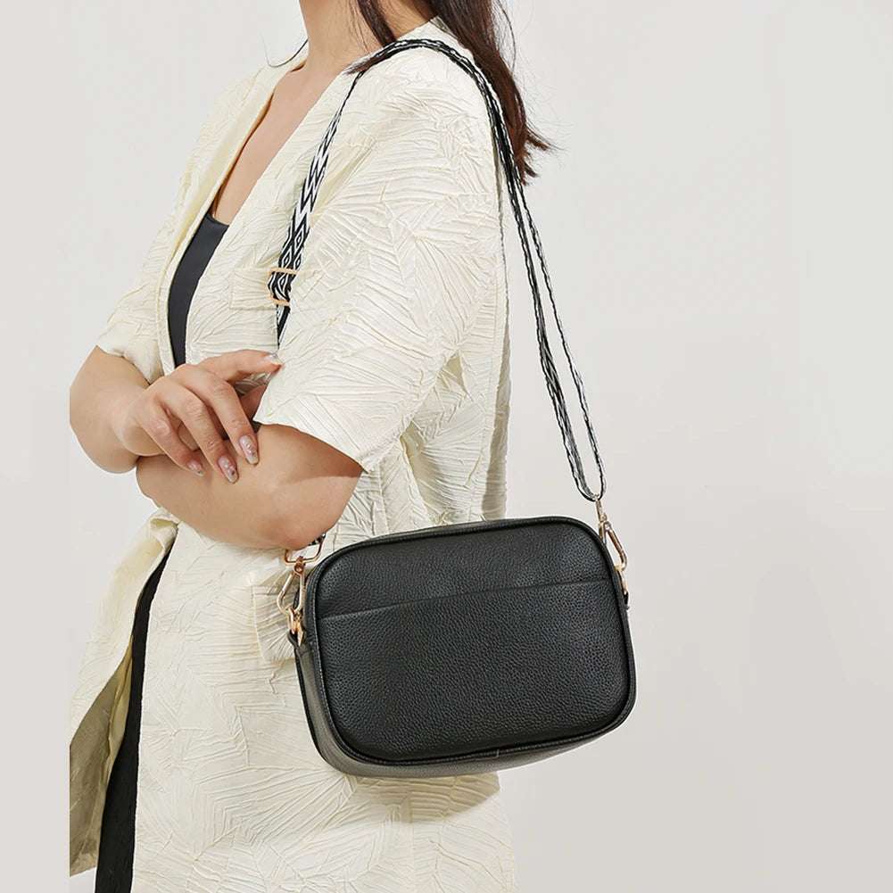 A modern women's handbag made of luxurious leather