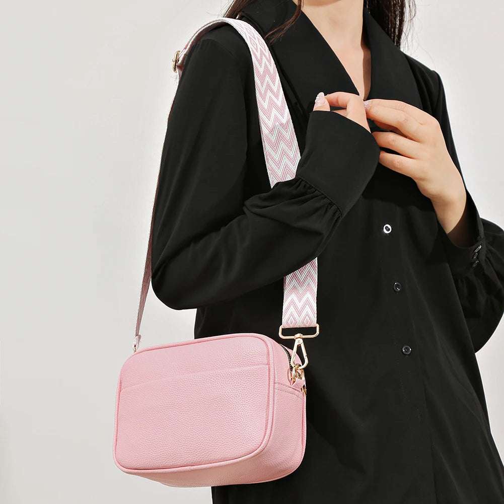 A modern women's handbag made of luxurious leather