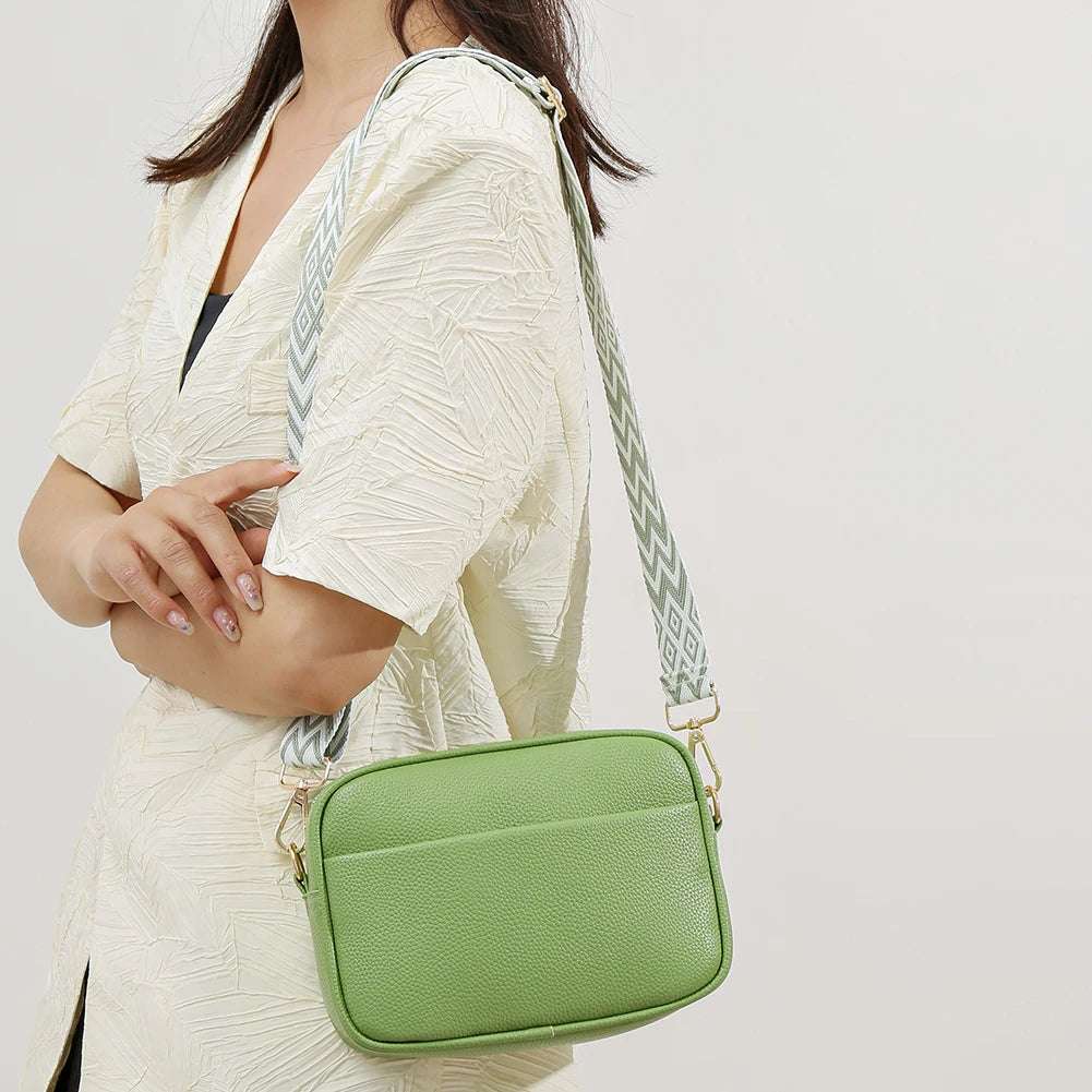 A modern women's handbag made of luxurious leather