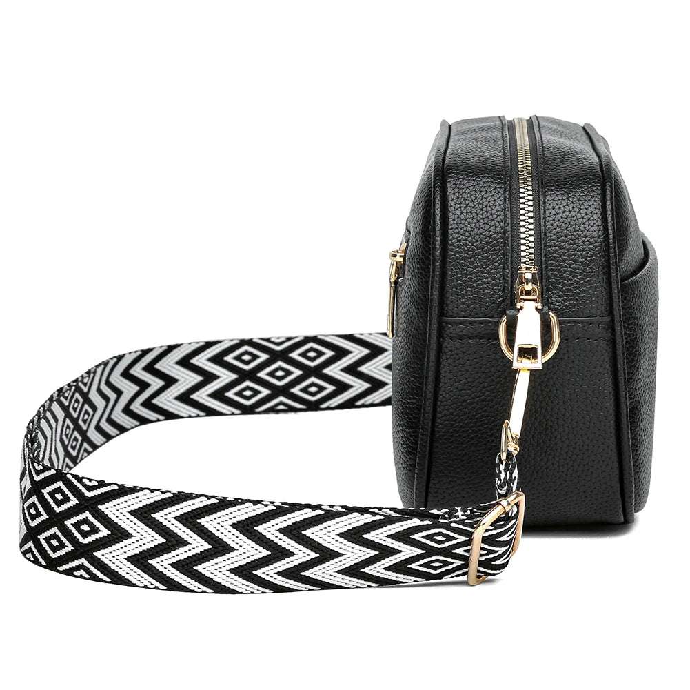 A modern women's handbag made of luxurious leather