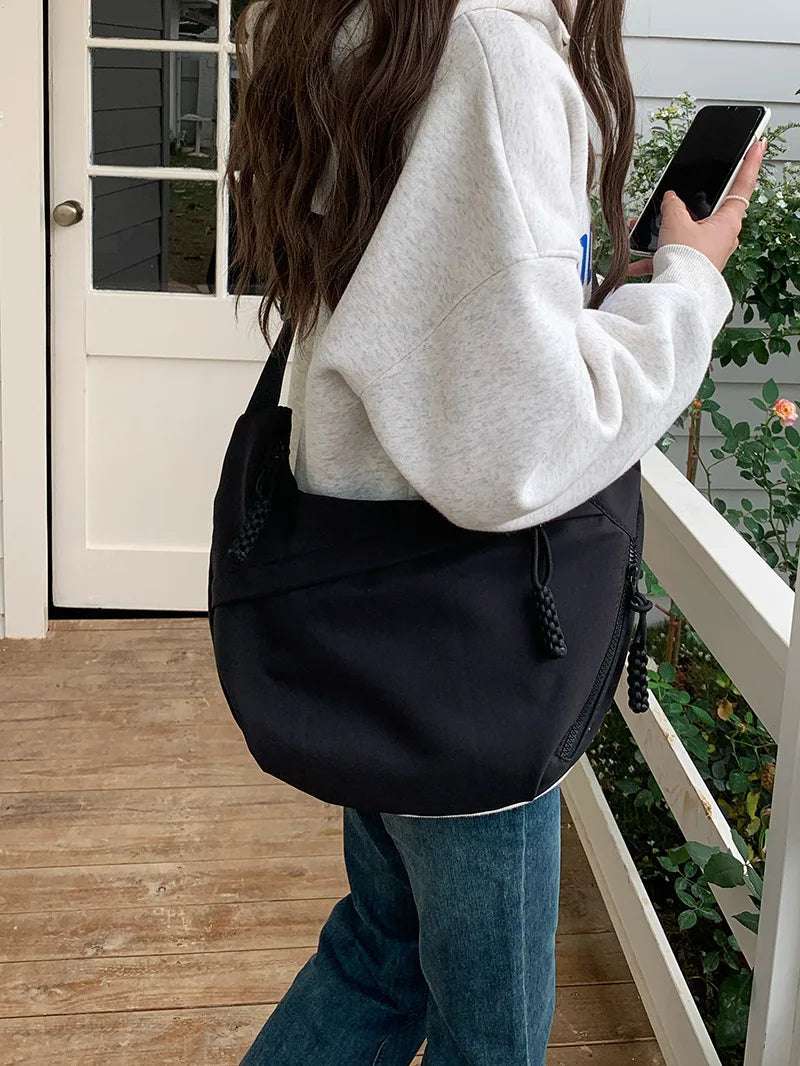 Large capacity shoulder bag