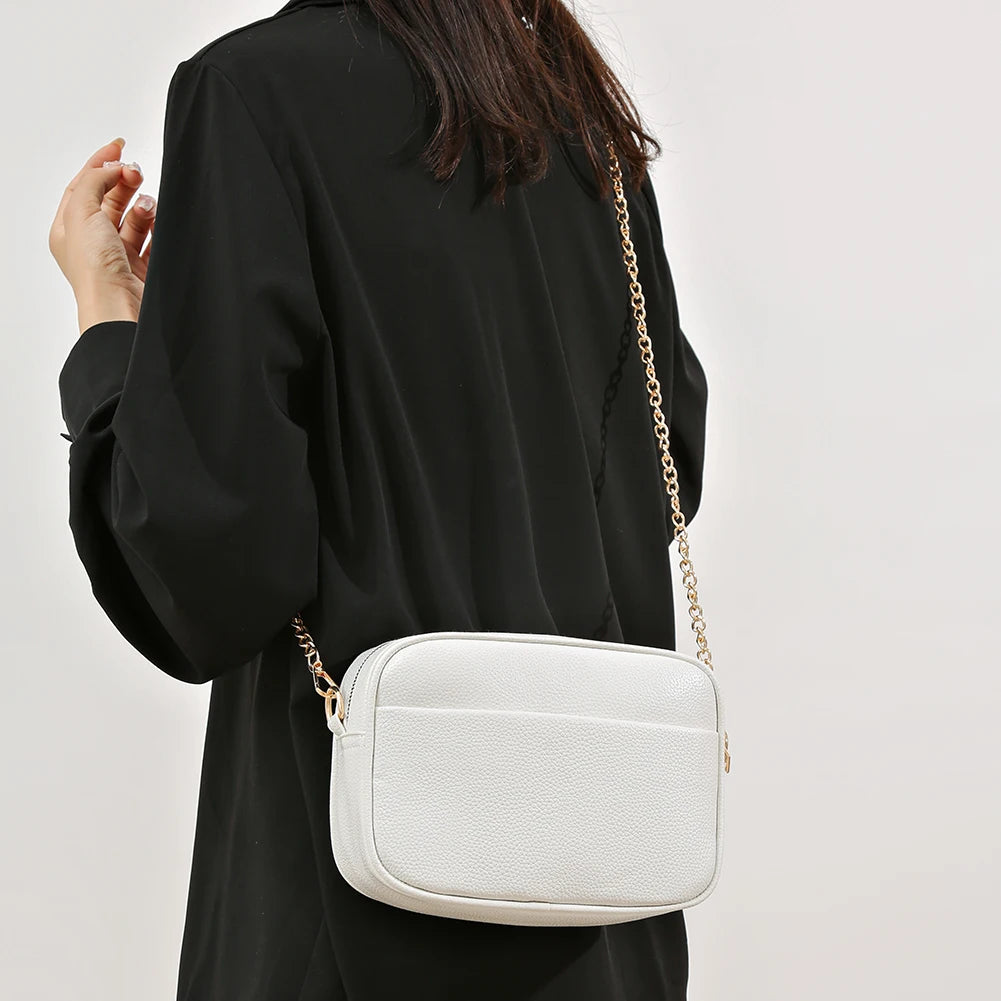 A modern women's handbag made of luxurious leather