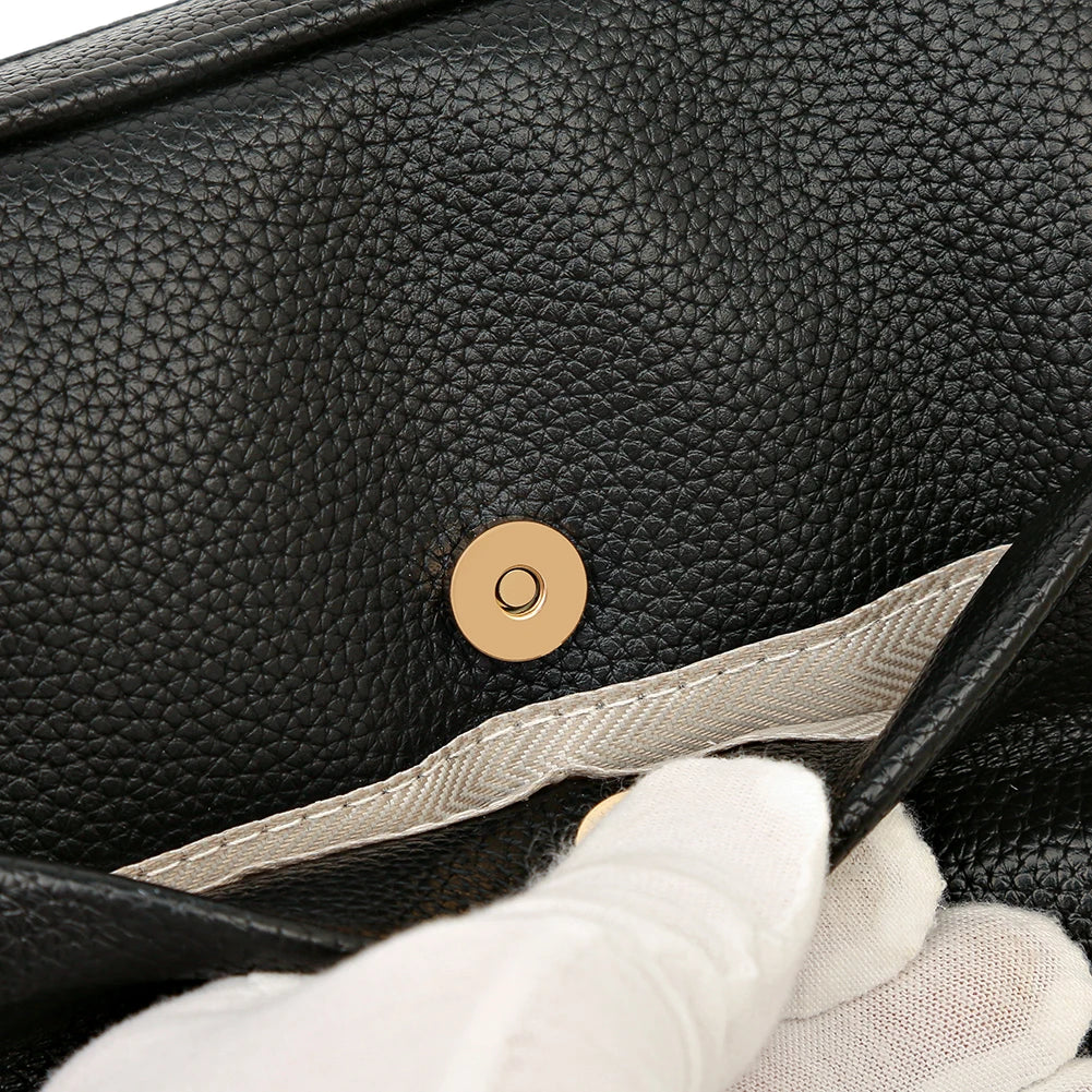A modern women's handbag made of luxurious leather
