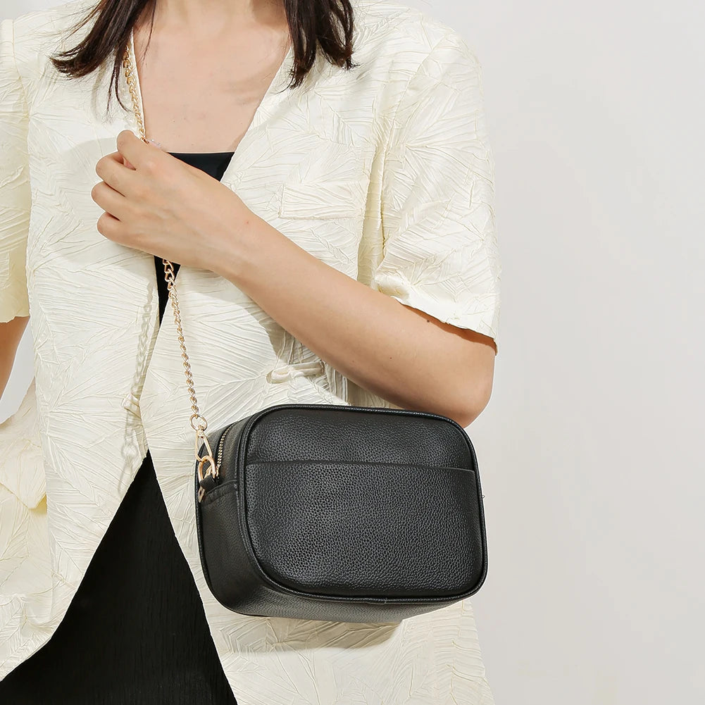 A modern women's handbag made of luxurious leather