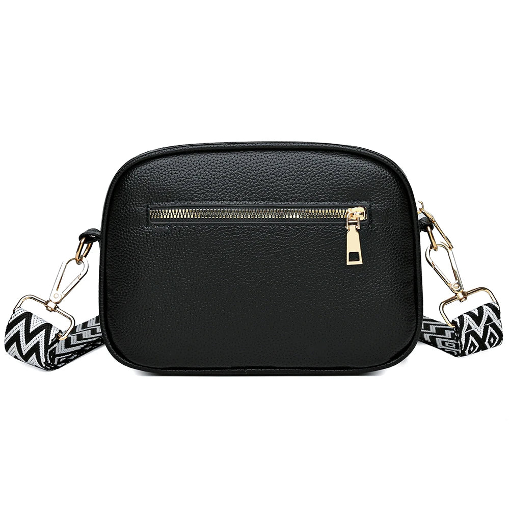 A modern women's handbag made of luxurious leather