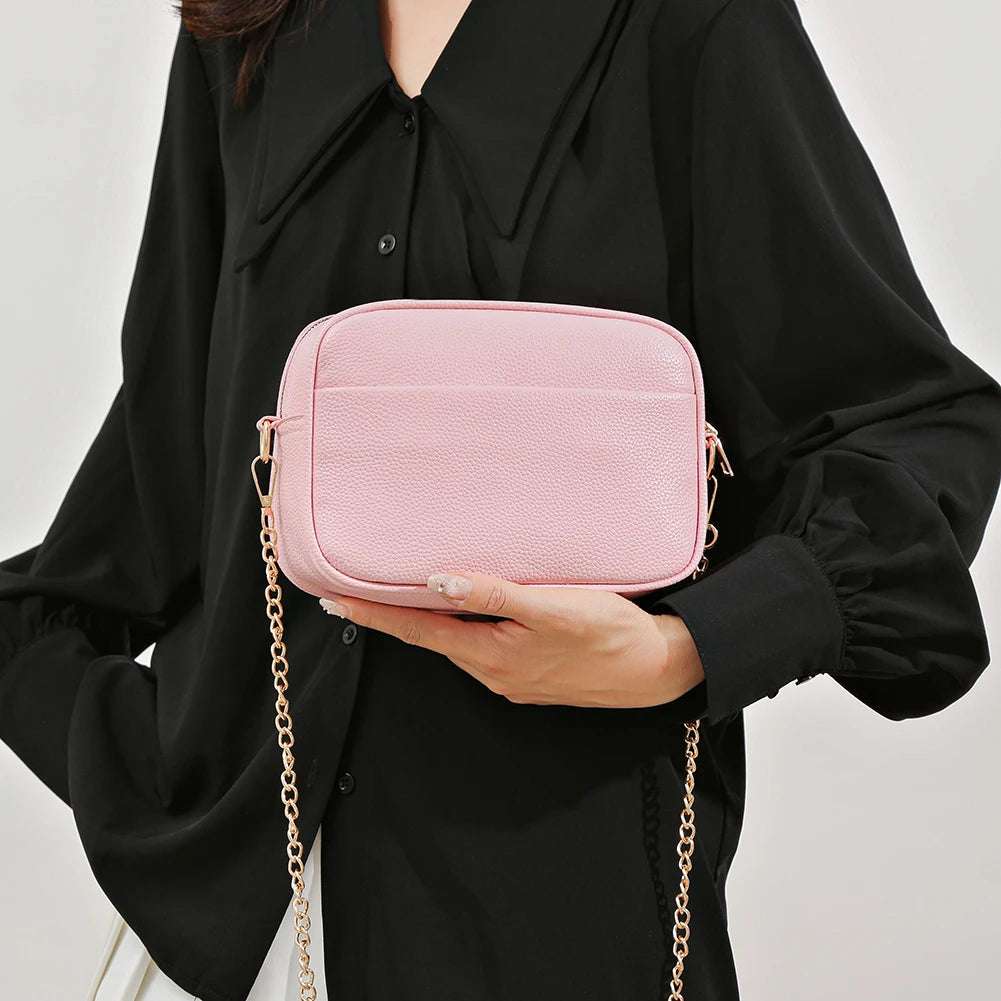 A modern women's handbag made of luxurious leather