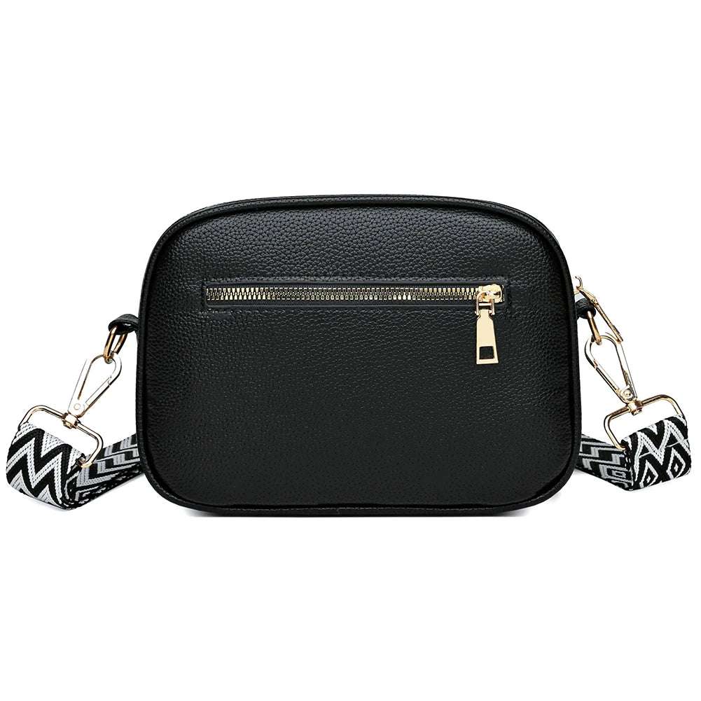 A modern women's handbag made of luxurious leather