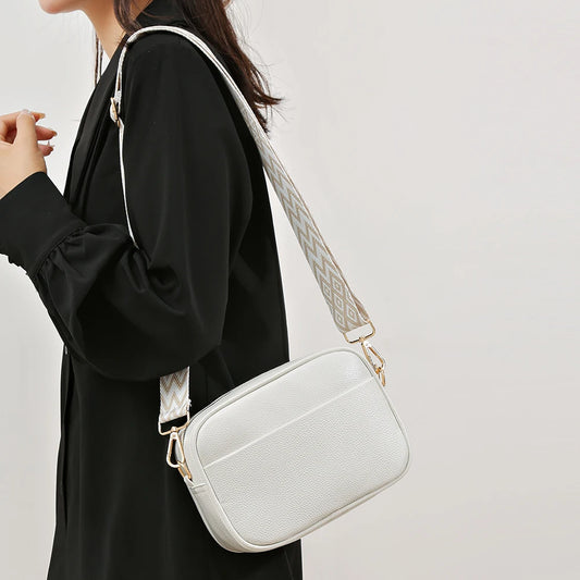 A modern women's handbag made of luxurious leather
